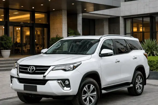 White Toyota Fortuner for Private Hotel Pick and Drop Desert Safari Abu Dhabi