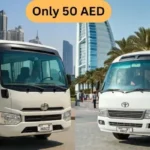 Two White Mini Buses for Pick and Drop Service in Abu Dhabi Desert Safari