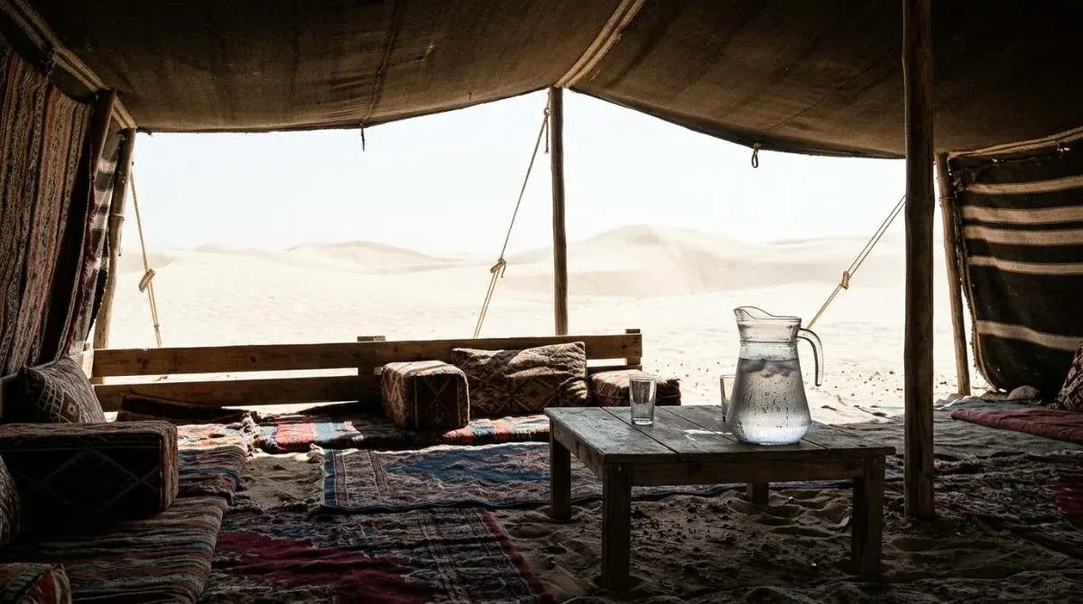 Shaded seating and cold water at the Abu Dhabi desert camp during the summer months