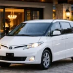 White Toyota Estima Van for Residence Pick and Drop Service Desert Safari Abu Dhabi